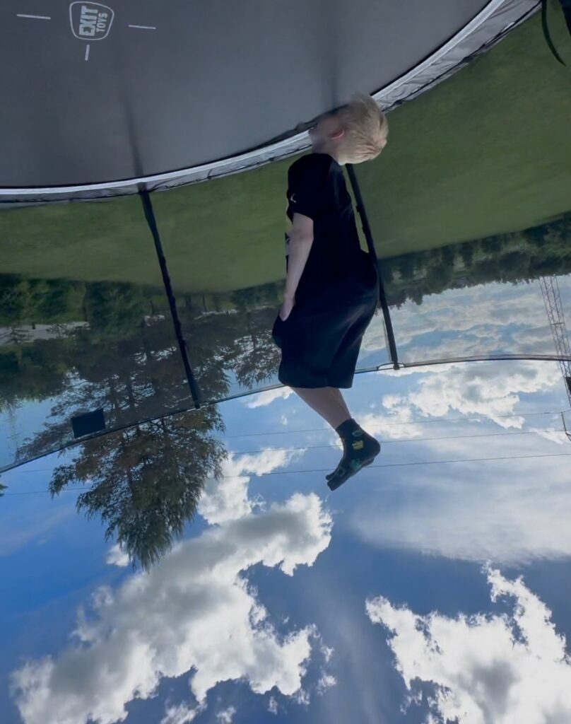 JakSam is in the air with a backflip