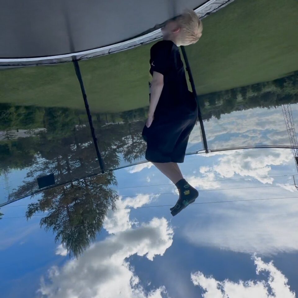 JakSam is in the air with a backflip